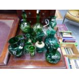 A COLLECTION OF 19th.C.GREEN GLASSWARES WITH WHTE ENAMEL DECORATION TO INCLUDE A PAIR OF DECANTERS