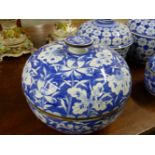 TWO PAIRS AND ANOTHER ORIENTAL BLUE AND WHITE COVERED BOWLS VARIOUSLY DECORATED WITH FLOWERS,