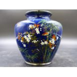 A JAPANESE DEEP BLUE GROUND CLOISONNE VASE WORKED WITH SONGBIRDS ABOUT CHERRY BLOSSOM AND BAMBOO,