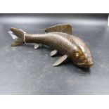 A JAPANESE BRONZE FIGURE OF A SWIMMING CARP. L.29cms.