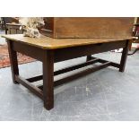 AN ANTIQUE PINE LOW COFFEE TABLE WITH STRETCHER BASE. L.152 x W.82 x H.53cms.