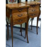 A PAIR OF FRENCH MARQUETRY INLAID LOUIS XV STYLE TWO DRAWER SIDE TABLES WITH SHAPED TOPS AND