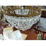 AN ORMOLU AND BAGUETTE CHANDELIER. APPROX Dia.35cms.