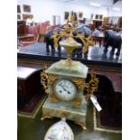 A LATE VICTORIAN GREEN ONYX CASED MANTLE CLOCK WITH PAINTED ENAMEL DIAL AND FRENCH BELL STRIKE