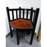 AN UNUSUAL ARTS AND CRAFTS STYLE SMALL OAK ARMCHAIR.
