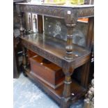 A 17th.C.AND LATER OAK THREE TIER BUFFET WITH CENTRAL FRIEZE DRAWER AND TURNED SUPPORTS. W.106 x H.