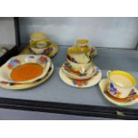 NEWPORT AND WILKINSON POTTERIES CLARICE CLIFF BIZARRE CROCUS PATTERN. A COLLECTION OF VARIOUS TEA