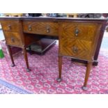AN EARLY 20th.C.MAHOGANY SIDEBOARD WITH ARRANGEMENT OF FIVE DRAWERS ON TURNED LEGS WITH CLUB FEET.