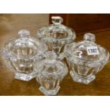 A SET OF THREE BACCARAT GLASS BON-BON DISHES AND COVERS AND ANOTHER SMALLER EXAMPLE. (4)