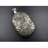A CHINESE FLASK EMBOSSED WITH CHRYSANTHEMUM DECORATION WITH A DETACHABLE CUP.