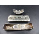 THREE PIECES OF WHITE METAL ORIENTAL CURRENCY WITH IMPRESSED CHARACTER MARKS.