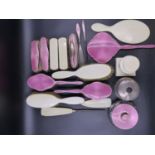 A PINK ENAMELLED SILVER SIX PIECE DRESSING TABLE SET, B'HAM 1933, THREE SIMILAR PIECES, A SILVER