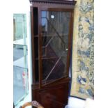 AN EARLY 20th.C.MAHOGANY FLOOR STANDING CORNER CABINET. W.68 x H.200cms