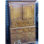 A GEO.III COUNTRY OAK SECRETAIRE LINEN PRESS. W.119 x H.185 x D.55cms