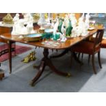 A GOOD QUALITY MAHOGANY TWIN PEDESTAL DINING TABLE ON TRIPOD SUPPORTS. THE TOP 217 x 111cms. H.
