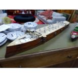 A WWI PERIOD SCRATCH BUILT MODEL BATTLE SHIP.