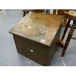 AN ARTS AND CRAFTS EMBOSSED COPPER MOUNTED RISING TOP COAL BOX. W.44cms.