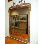 A 19th.C.GILTWOOD AND GESSO FRAMED WALL MIRROR WITH SCROLLED WIRE FRAMED SURMOUNT. 83 x 60cms.