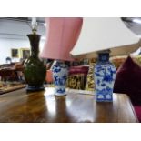 A CHINESE BLUE AND WHITE COVERED VASE OF SQUARE SECTION WITH FIGURAL DECORATION MOUNTED AS A LAMP,