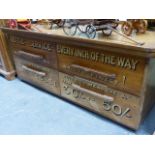 A VINTAGE FOUR DRAWER MEN'S TAILORS/HABERDASHERY CABINET. TRAY TOP, THE DRAWER FRONTS DECORATED WITH