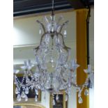 A LARGE GLASS CAGE FORM FRENCH STYLE TWELVE LIGHT CHANDELIER AND TWO OTHER SMALLER. (3)