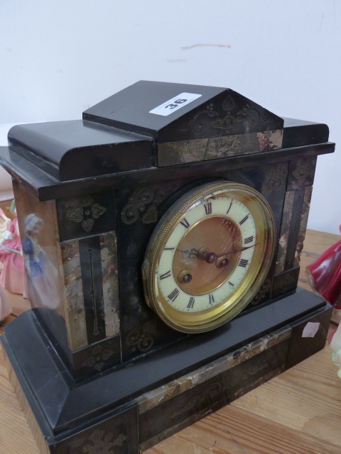 A VICTORIAN MANTLE CLOCK.