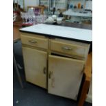 A VINTAGE ENAMEL TOP KITCHEN CABINET.