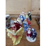 ELEVEN DOULTON FIGURINES.