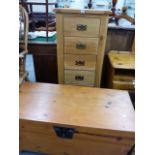 A TALL OAK CHEST OF DRAWERS AND A PINE BLANKET BOX.