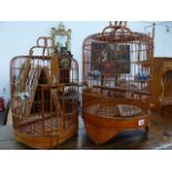 TWO ORIENTAL BIRD CAGES.