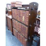 A SET OF LEATHER BOUND ENCYCLOPEDIA IN ORIGINAL OAK BOOKCASE.