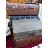 A QTY OF VINTAGE TRUNKS.