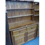 A GOOD QUALITY HARDWOOD DRESSER.