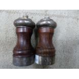 SILVER MOUNTED ROSEWOOD CAPSTAN SHAPED PEPPER AND SALT MILLS.