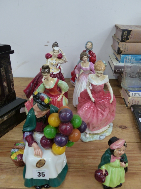 EIGHT ROYAL DOULTON FIGURINES TO INCLUDE THE BALLOON SELLER.