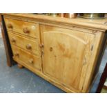 A VICTORIAN PINE DRESSER.