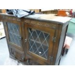 AN OAK BOOKCASE.