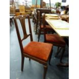 A SET OF EDWARDIAN MAHOGANY DINING CHAIRS.