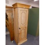 A TALL PINE HALL CABINET.