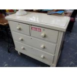 A PAINTED PINE CHEST OF DRAWERS.