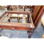 A LARGE MAHOGANY DINING TABLE.