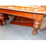 A VICTORIAN MAHOGANY DINING TABLE.