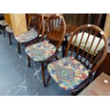 FIVE ERCOL HOOP BACK CHAIRS.