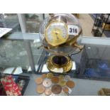 A RLATIVE HUMIDITY HYGROMETER GLOBE AND VARIOUS COINS.