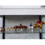 A QUANTITY OF BESWICK AND OTHER PORECLAIN, RIDER AND HORSE, HOUNDS AND FOXES.