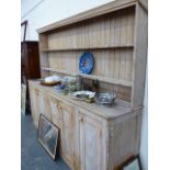 A LARGE PINE DRESSER.