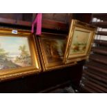 THREE GILT FRAMED OIL PAINTINGS.