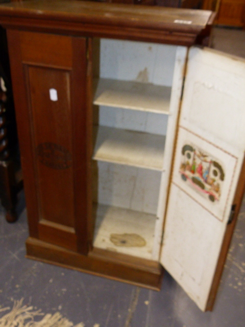 A VINTAGE CIGAR CABINET.