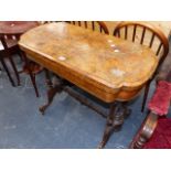 A WALNUT FOLD OVER CARD TABLE.