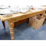 A LARGE ANTIQUE STYLE PINE KITCHEN TABLE.